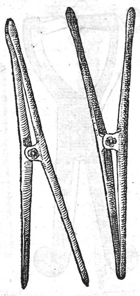 An illustration from La maniere de traicter les playes faictes tant par hacquebutes, que par fleches : et les accidentz d’icelles, comme fractures et caries des os, gangrene et mortification : avec les pourtraictz des instrumentz necessaires pour leur curation. Et la methode de curer les combustions principalement faictes par la pouldre à canon. Le tout composé par Ambroise Paré, maistre Barbier Chirurgien à Paris, 1552, leaf 29