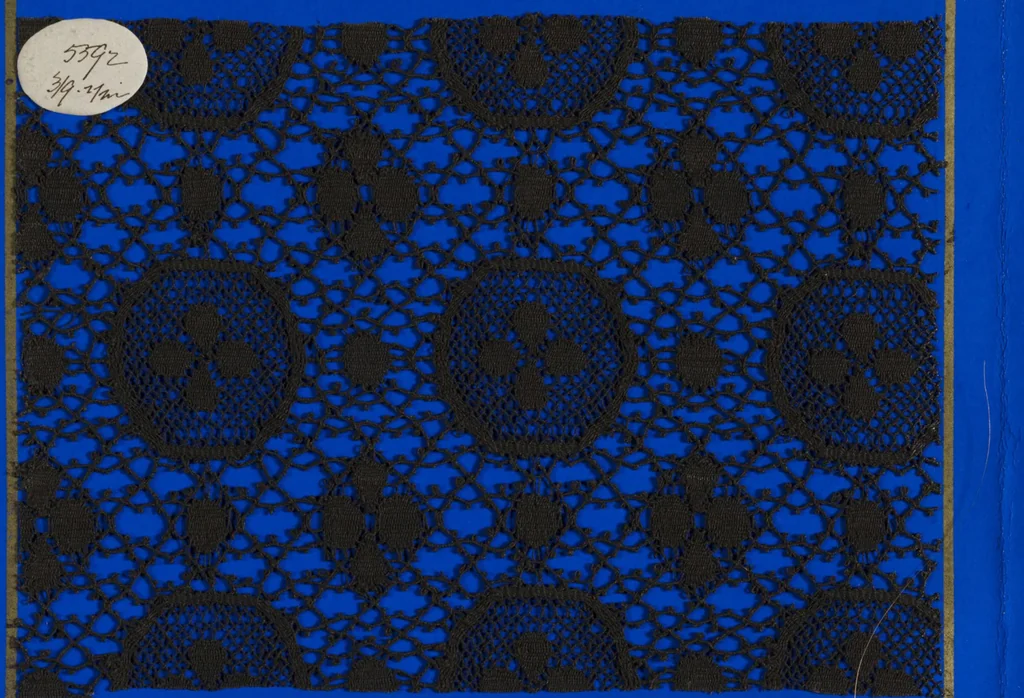 An illustration from Lace sample book, 1900, leaf 29