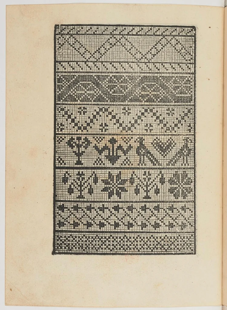 An illustration from Ein new Modelbuch auff aussnehen und porten wircken in der Laden unnd langengestell Gemert und gepessert mit 105 andern Modeln, 1527, leaf 23