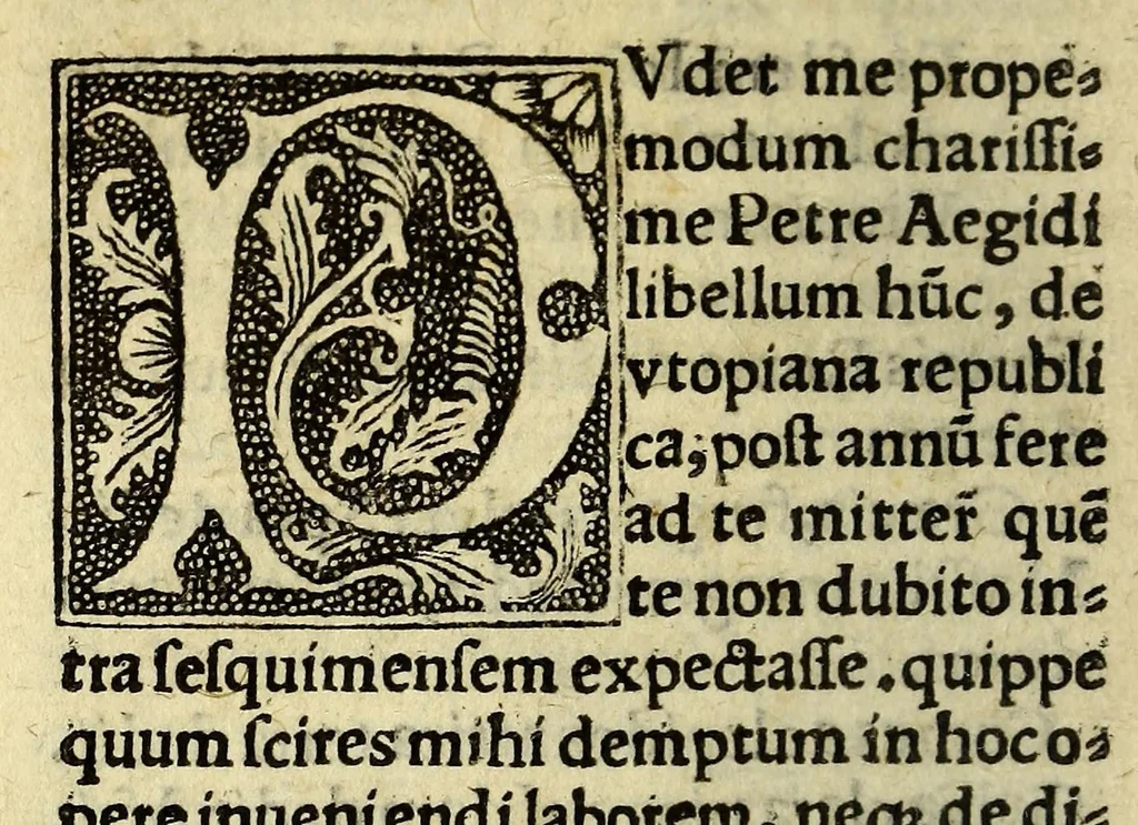 An illustration from Ad lectorem. Habes candide lector opusculum illud vere aureu[m] Thomæ Mori no[n] min[us] vtile q[uam] elega[n]s de optimo reipublic[a]e statu, deq[ue] noua insula Vtopia, iam iteru[m], sed multo correcti[us] q[uam] pri[us], hac enchiridij forma vt vides multo[rum] tu[m] senatoru[m] tu[m] alioru[m] grauissimoru[m] viro[rum] suasu æditu[m], quod sane tibi [a]edisce[n]dum no[n] modo in manib[us] quotidie habendu[m] ce[n]seo. : Cui quide[m] ab innumeris me[n]dis vndequaq[ue] purgatio p[rae]ter Erasmi annotatio[n]es ac Budæi ep[isto]lam: viroru[m] sane qui hoc sæculo nostro extra omnne[m] ingenij aleam positi sunt: addita est etia[m] ipsius Mori ep[isto]la eruditissima ., 1517, leaf 32