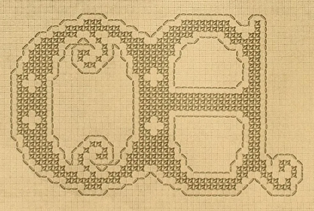 An illustration from Album de broderies au point de croix, 1890, leaf 28