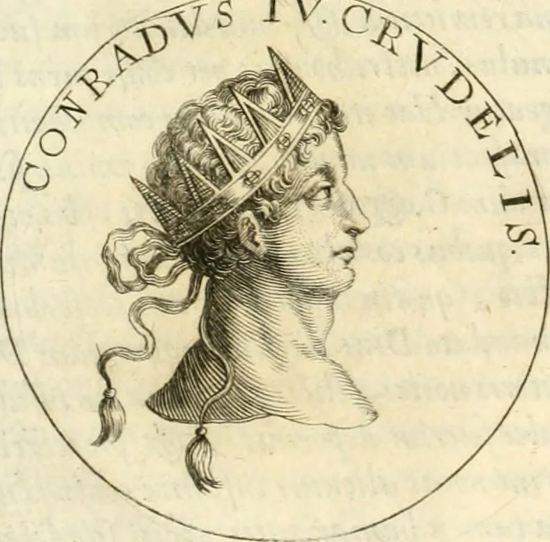An illustration from Aquila Sueua, sub qua imperatores Sueui a Conrado III vsquè ad Conradum IV Occidentis imperatorem XXVII : elogiis, hieroglyphicis, numismatibus, insignibus, symbolis, imaginibus antiquis ad viuum exhibentur exculpti, & longa historiarum serie exarati : vt nihil relictum sit, quod prisci vel hodierni habeant annales, sed diplomata, leges, indulta, genealogiae, donationes, priuilegia offeruntur congesta : inseruntur et regum principumque imagines, nummi honorarij, castrenses, triumphales, votiui, missiles, &c. qui sanguine, foedere, bello Imperatoribus iuncti, occurrunt in opere : accedit cuique caesarum tractatus sacrolegalis & historicopoliticus ..., 1679, leaf 427