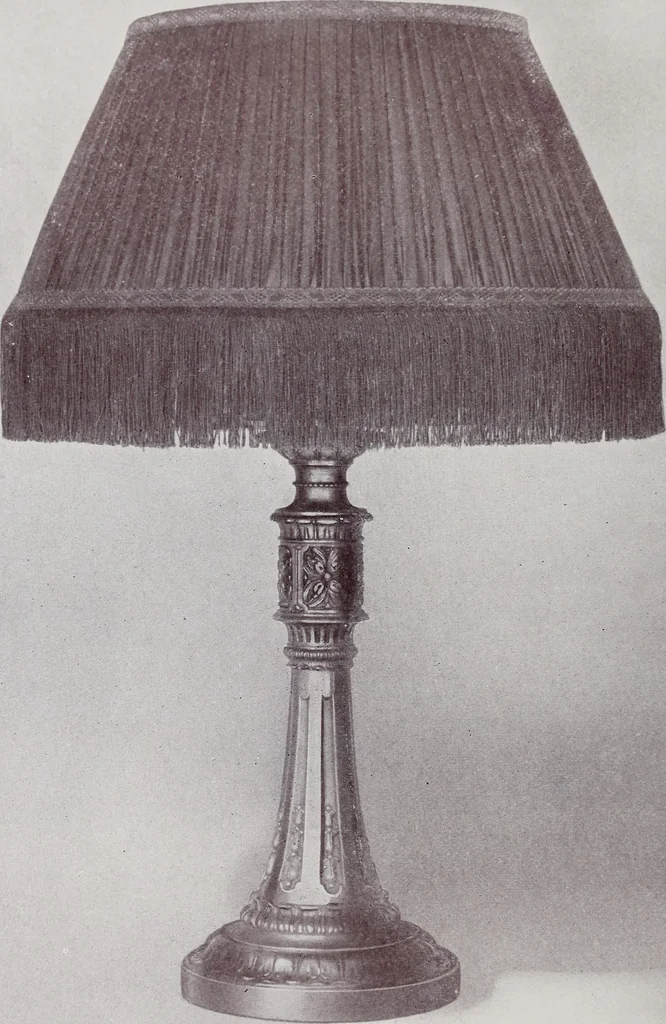 An illustration from Armor bronze : artistic and ideal gifts in book ends, door stops, art objects, table and floor lamps, 1900, leaf 57