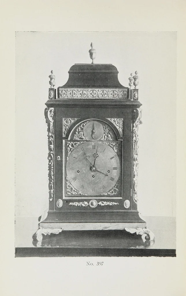 An illustration from Catalogue of the highly interesting and valuable collection of authentic Spanish antiques formed by Señor Luis Ruiz... : silver cathedral lanterns of the XVII century, the very rare carpets of the XVI & XVII century, the primitive paintings with their Gothic frames, also the wood and stone carvings, the Barguenos, cabinets, chests and chairs, the iron work and the old laces and fabrics, 1921, leaf 22