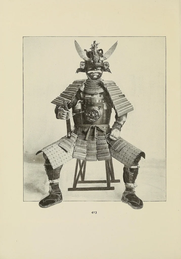An illustration from Catalogue of arms and armor of old Japan : examples of the famous Miyochin's, and others celebrated for their work in metals : also sword guards, knife handles, pewter, carvings, brocades and other objects of interest to amateurs and connoisseurs :gathered on a recent visit to Japan by Bunkio Matsuki, 1905, leaf 14