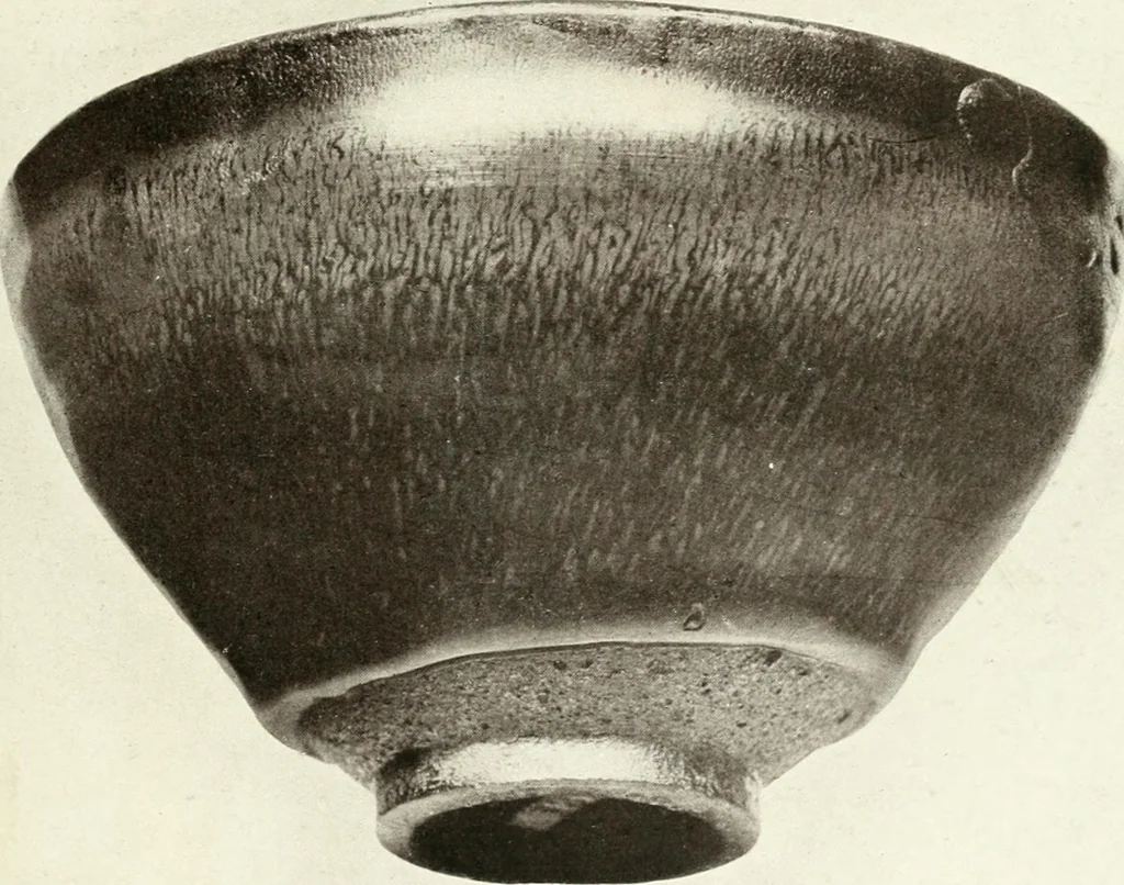 An illustration from Chinese pottery and porcelain : an account of the potter's art in China from primitive times to the present day, 1915, leaf 254