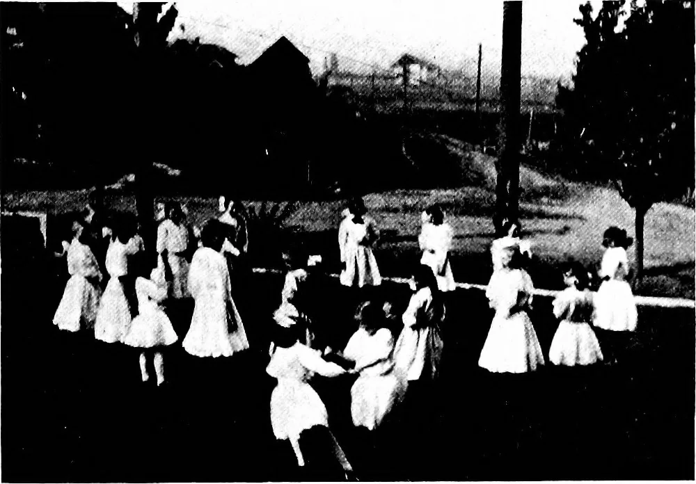 An illustration from Play, comprising games for the kindergarten, playground, schoolroom and college; how to coach and play girls' basket-ball, etc, 1918, leaf 200