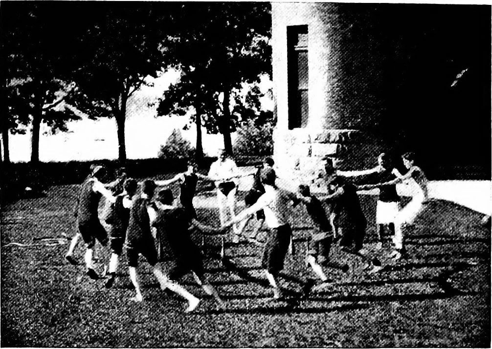 An illustration from Play, comprising games for the kindergarten, playground, schoolroom and college; how to coach and play girls' basket-ball, etc, 1918, leaf 206