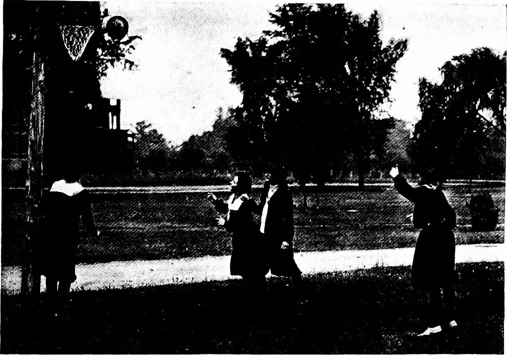 An illustration from Play, comprising games for the kindergarten, playground, schoolroom and college; how to coach and play girls' basket-ball, etc, 1918, leaf 242