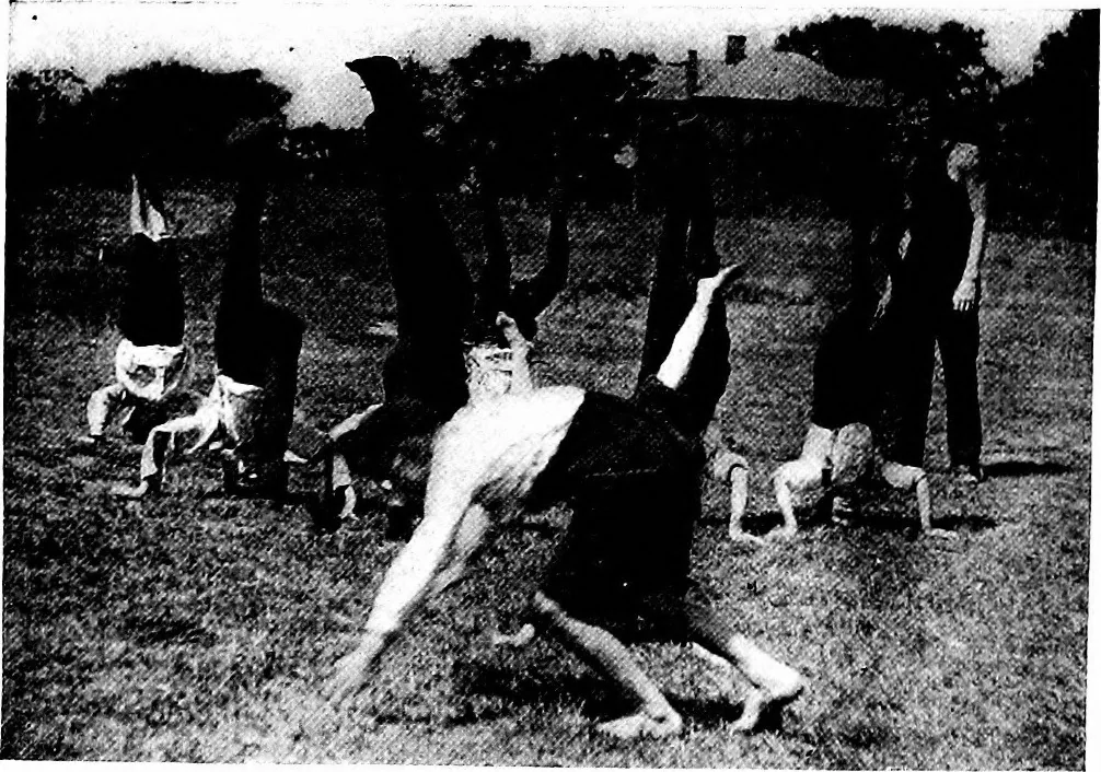 An illustration from Play, comprising games for the kindergarten, playground, schoolroom and college; how to coach and play girls' basket-ball, etc, 1918, leaf 57