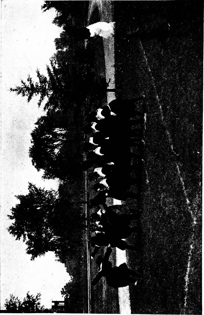 An illustration from Play, comprising games for the kindergarten, playground, schoolroom and college; how to coach and play girls' basket-ball, etc, 1918, leaf 9