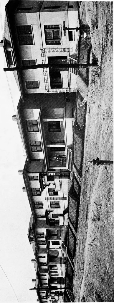 An illustration from The housing book; containing photographic reproductions, with floor plans of workingmen's homes. One and two family houses of frame, brick, stucco and concrete construction; also four, six and nine family apartments. Showing single houses, groups and developments that have been built in various parts of the United States, 1919, leaf 114
