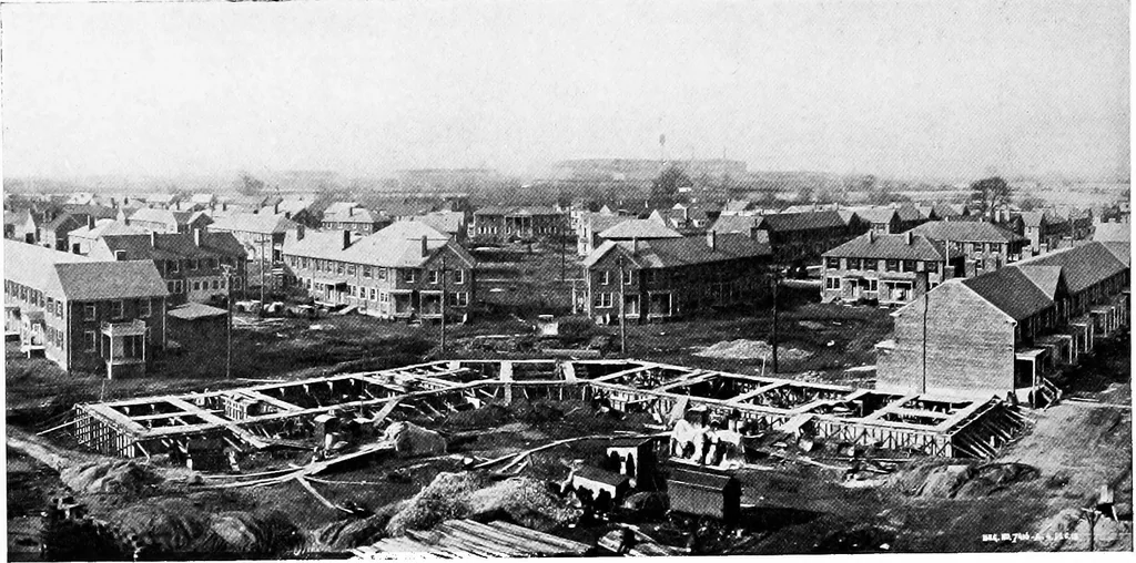 An illustration from The housing book; containing photographic reproductions, with floor plans of workingmen's homes. One and two family houses of frame, brick, stucco and concrete construction; also four, six and nine family apartments. Showing single houses, groups and developments that have been built in various parts of the United States, 1919, leaf 129