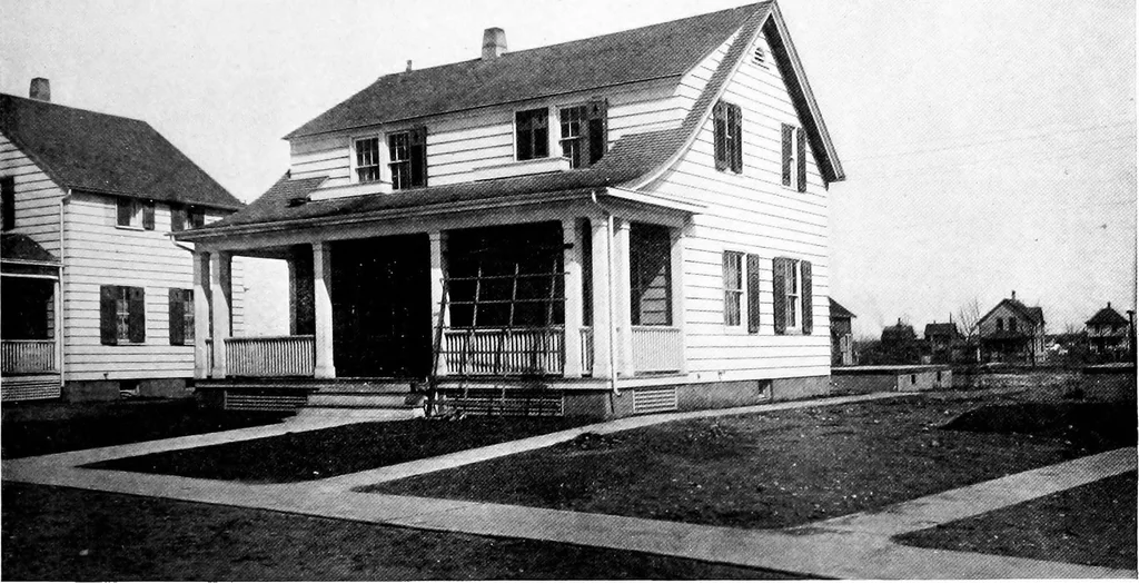 An illustration from The housing book; containing photographic reproductions, with floor plans of workingmen's homes. One and two family houses of frame, brick, stucco and concrete construction; also four, six and nine family apartments. Showing single houses, groups and developments that have been built in various parts of the United States, 1919, leaf 24