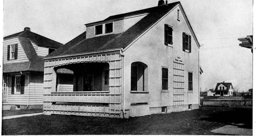 An illustration from The housing book; containing photographic reproductions, with floor plans of workingmen's homes. One and two family houses of frame, brick, stucco and concrete construction; also four, six and nine family apartments. Showing single houses, groups and developments that have been built in various parts of the United States, 1919, leaf 26