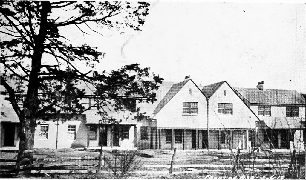 An illustration from The housing book; containing photographic reproductions, with floor plans of workingmen's homes. One and two family houses of frame, brick, stucco and concrete construction; also four, six and nine family apartments. Showing single houses, groups and developments that have been built in various parts of the United States, 1919, leaf 70