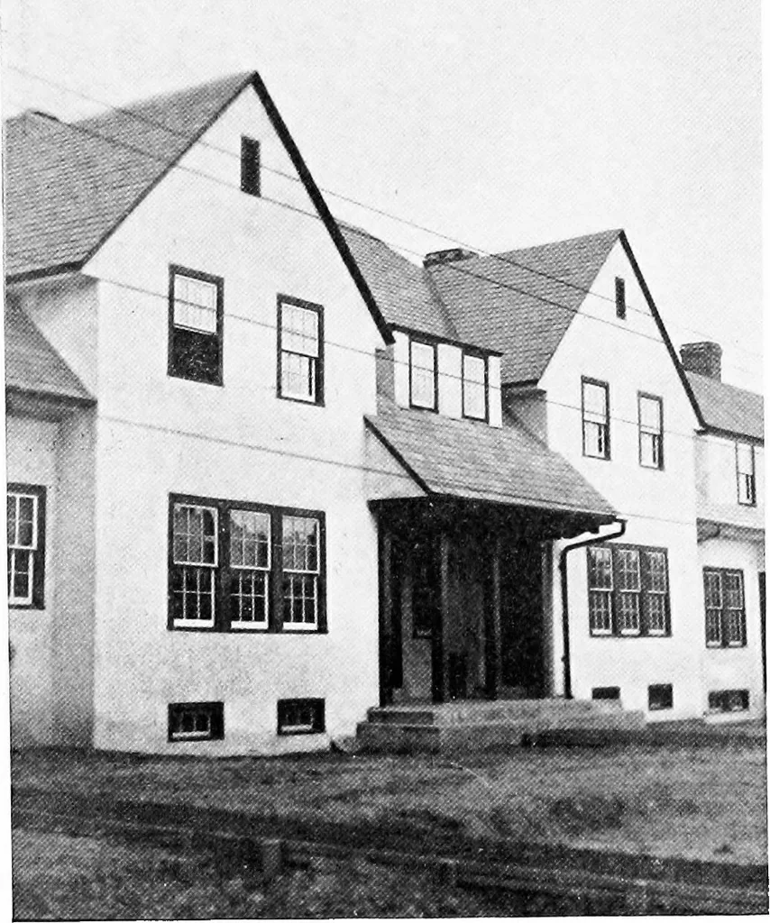 An illustration from The housing book; containing photographic reproductions, with floor plans of workingmen's homes. One and two family houses of frame, brick, stucco and concrete construction; also four, six and nine family apartments. Showing single houses, groups and developments that have been built in various parts of the United States, 1919, leaf 73
