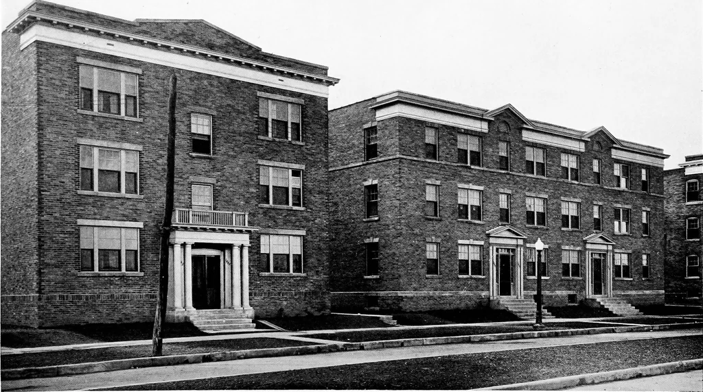 An illustration from The housing book; containing photographic reproductions, with floor plans of workingmen's homes. One and two family houses of frame, brick, stucco and concrete construction; also four, six and nine family apartments. Showing single houses, groups and developments that have been built in various parts of the United States, 1919, leaf 89