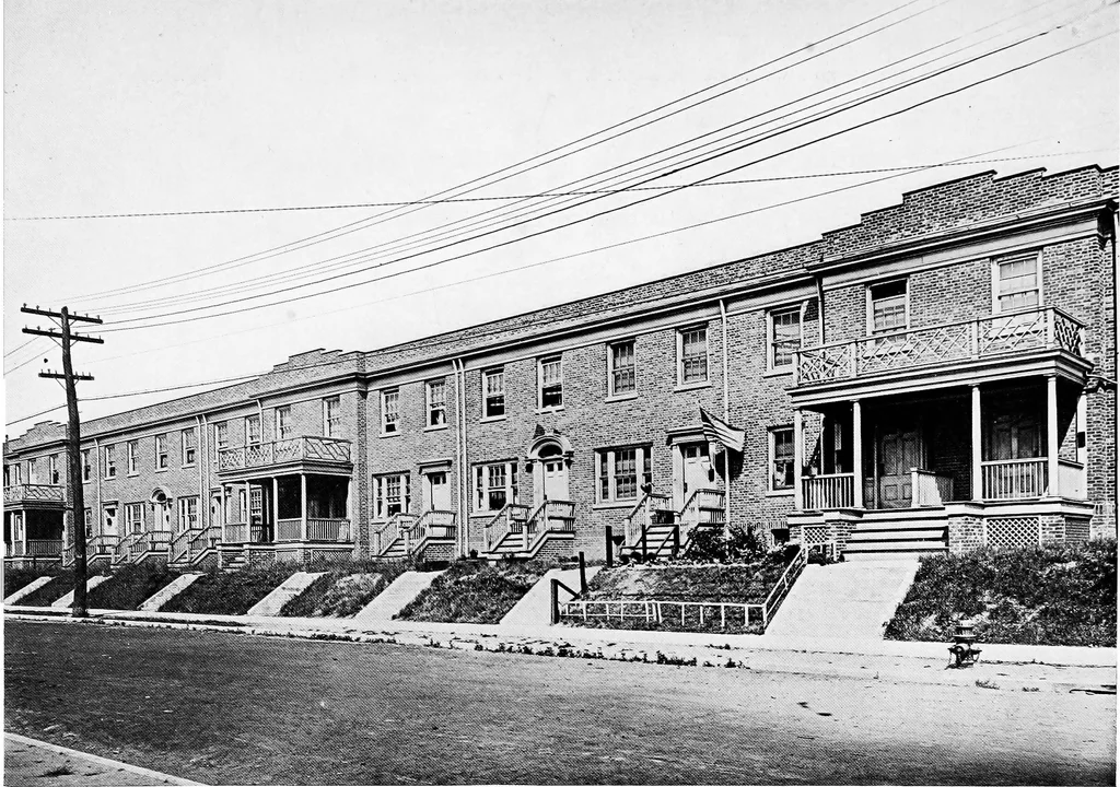 An illustration from The housing book; containing photographic reproductions, with floor plans of workingmen's homes. One and two family houses of frame, brick, stucco and concrete construction; also four, six and nine family apartments. Showing single houses, groups and developments that have been built in various parts of the United States, 1919, leaf 98