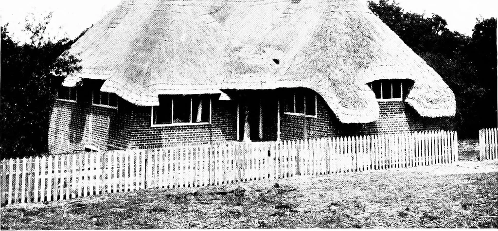 An illustration from Country cottages and week-end homes, by J. H. Elder-Duncan ... with numerous illustrations and plans of cottages by well-known architects, 1912, leaf 57