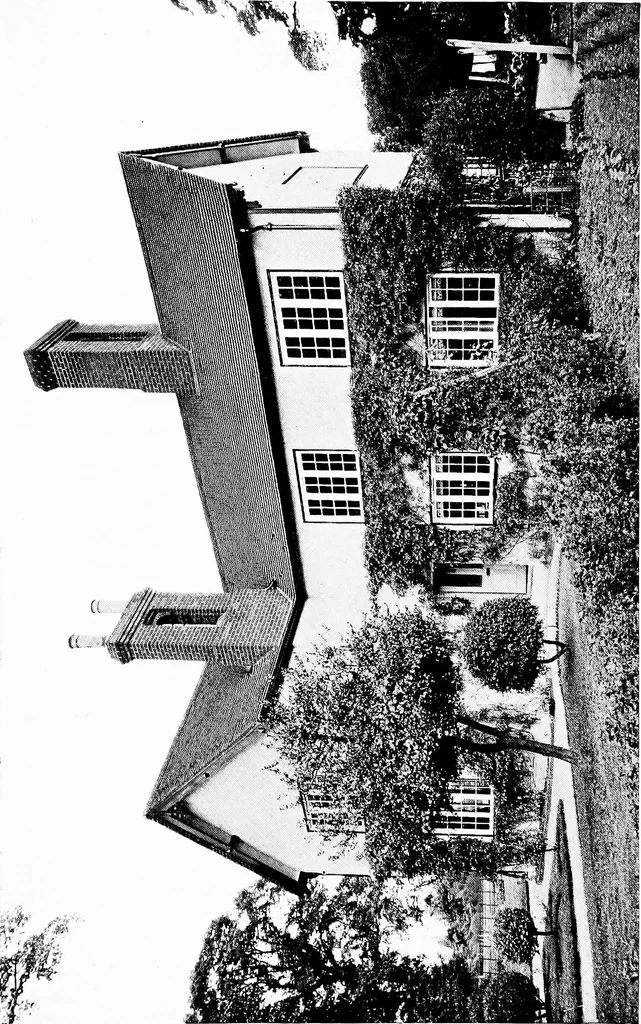An illustration from Country cottages and week-end homes, by J. H. Elder-Duncan ... with numerous illustrations and plans of cottages by well-known architects, 1912, leaf 72