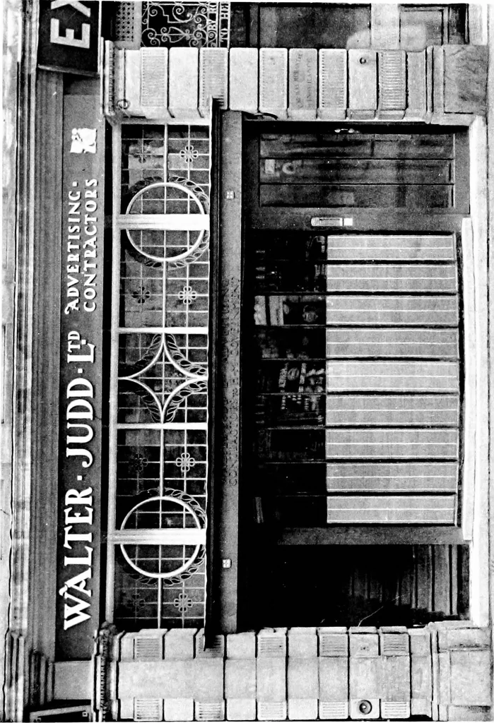 An illustration from English shop-fronts, old and new : a series of examples by leading architects, selected and specially photographed : together with descriptive notes and illustrations, 1907, leaf 102