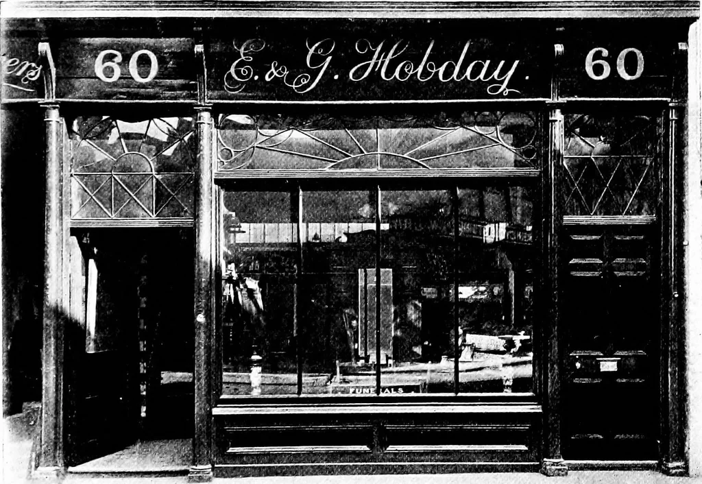 An illustration from English shop-fronts, old and new : a series of examples by leading architects, selected and specially photographed : together with descriptive notes and illustrations, 1907, leaf 26