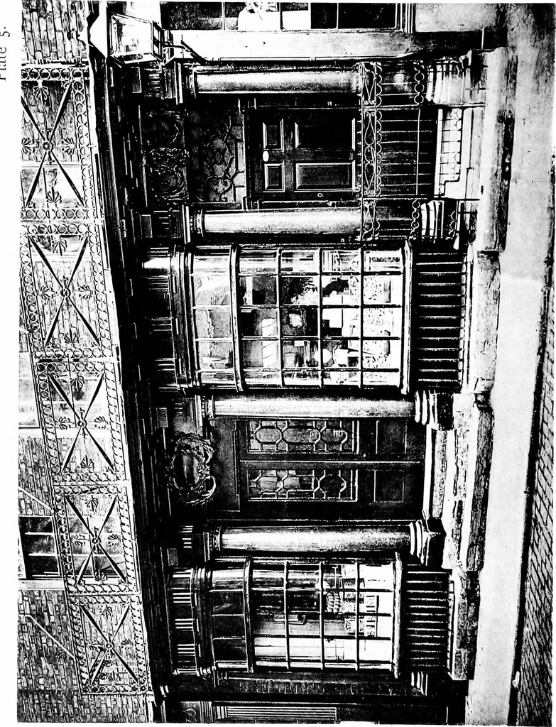 An illustration from English shop-fronts, old and new : a series of examples by leading architects, selected and specially photographed : together with descriptive notes and illustrations, 1907, leaf 7