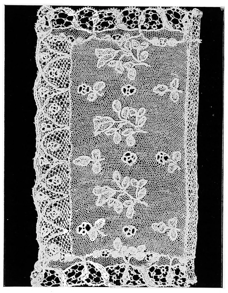 An illustration from Point and pillow lace : a short account of various kinds, ancient and modern, and how to recognise them, 1899, leaf 80