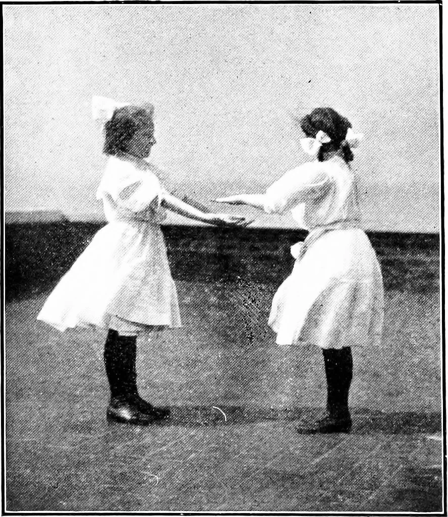 An illustration from Folk-dances and singing games; Dances of the people, 1909, leaf 24
