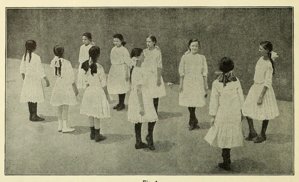 An illustration from Dances of the people : a second volume of Folk-dances and singing games; containing twenty-eight folk-dances of the United States, Ireland, England, Scotland, Norway, Sweden, Denmark, Finland, Germany, and Switzerland; with the music, full directions for performance and numerous illustrations, 1913, leaf 28