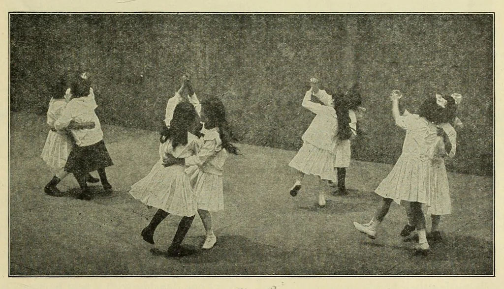 An illustration from Dances of the people : a second volume of Folk-dances and singing games; containing twenty-eight folk-dances of the United States, Ireland, England, Scotland, Norway, Sweden, Denmark, Finland, Germany, and Switzerland; with the music, full directions for performance and numerous illustrations, 1913, leaf 57