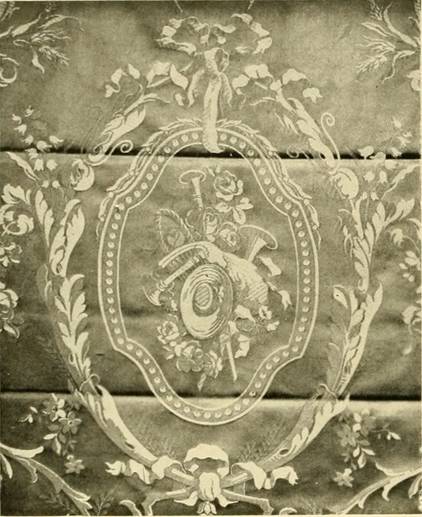 An illustration from Decorative textiles; an illustrated book on coverings for furniture, walls and floors, including damasks, brocades and velvets, tapestries, laces, embroideries, chintzes, cretones, drapery and furniture trimmings, wall papers, carpets and rugs, tooled and illuminated leathers, 1918, leaf 35