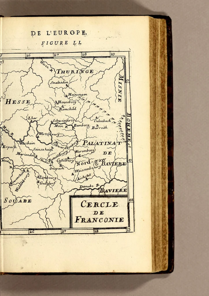 An illustration from Description de l'univers, : contenant les differents systêmes du monde, les cartes generales & particulieres de la geographie ancienne & moderne : les plans & les profils des principales villes & des autres lieux plus considerables de la terre ; avec les portraits des souverains qui y commandent, leurs blasons, titres & livrées : et les mœurs, religions, gouvernemens & divers habillemens de chaque nation. Dediee au roy., 1683, leaf 127