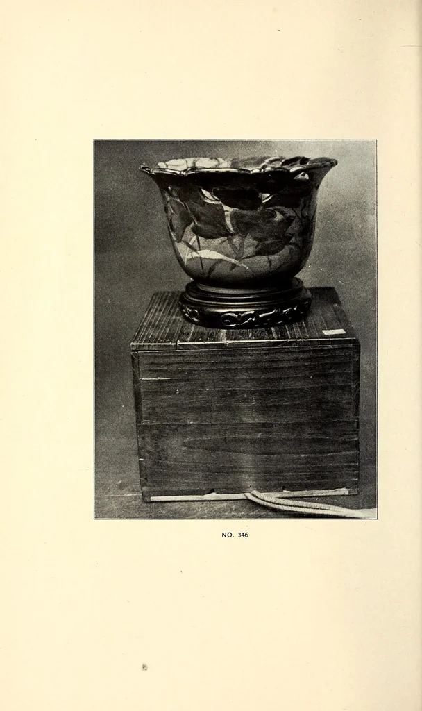 An illustration from Descriptive catalogue of an important keramic collection of Japanese and Chinese pottery, porcelain, bronzes, lacquers, brocade, prints, embroideries, kakemono, screens, ethnological and buddhist objects selected by Mr. Bunkio Matsuki of Kobe, Japan, and Boston, 1898, leaf 72
