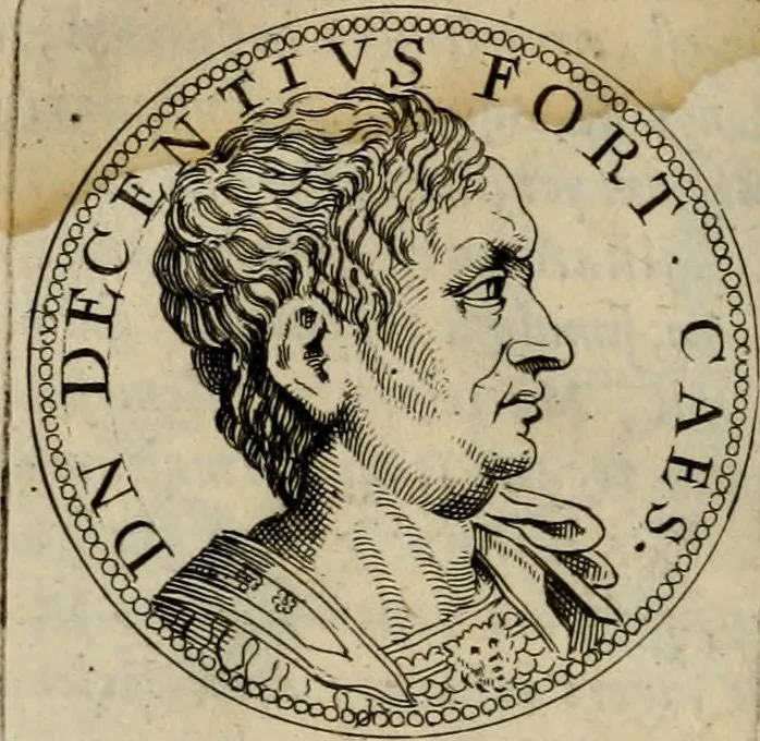 An illustration from De vita et moribus imperatorum Romanorum: excerpta ex libris Sexti Aurelii Victoris, à Caesare Augusto usque ad Theodosium imperatorem. Andreas Schottus compositis tribus M.SS. cum Vett. vulgatis emendabat; scholiis & veris iconibus ex antiquis numismatis delineatis illustrabat. Quibus accesserunt & Eliae Vineti notae, 1669, leaf 111