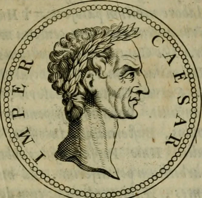An illustration from De vita et moribus imperatorum Romanorum: excerpta ex libris Sexti Aurelii Victoris, à Caesare Augusto usque ad Theodosium imperatorem. Andreas Schottus compositis tribus M.SS. cum Vett. vulgatis emendabat; scholiis & veris iconibus ex antiquis numismatis delineatis illustrabat. Quibus accesserunt & Eliae Vineti notae, 1669, leaf 12