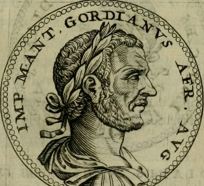 An illustration from De vita et moribus imperatorum Romanorum: excerpta ex libris Sexti Aurelii Victoris, à Caesare Augusto usque ad Theodosium imperatorem. Andreas Schottus compositis tribus M.SS. cum Vett. vulgatis emendabat; scholiis & veris iconibus ex antiquis numismatis delineatis illustrabat. Quibus accesserunt & Eliae Vineti notae, 1669, leaf 86