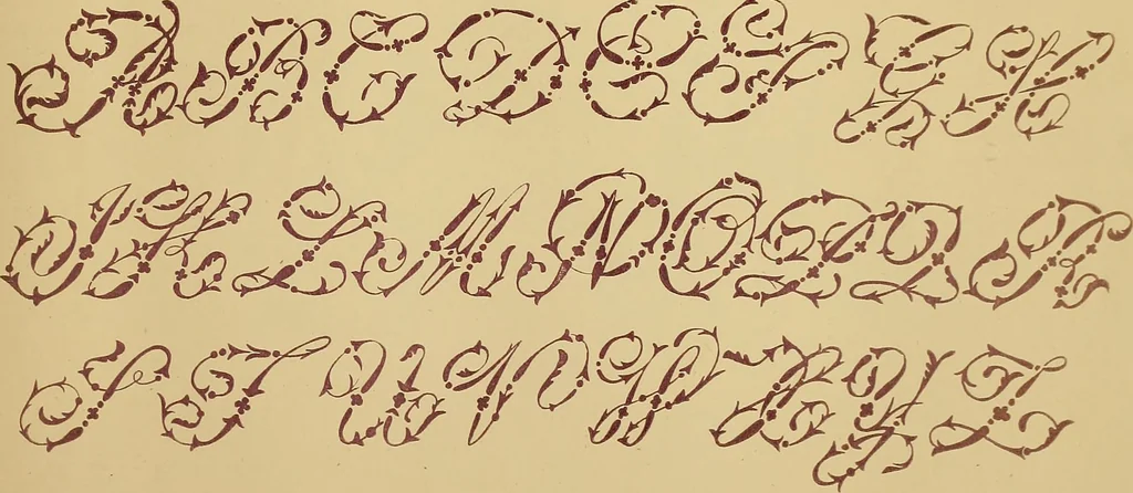 An illustration from The embroiderer's book of design : containing initials, emblems, cyphers, monograms, ornamental borders, ecclesiastical devices, mediæval and modern alphabets, and national emblems, 1891, leaf 14