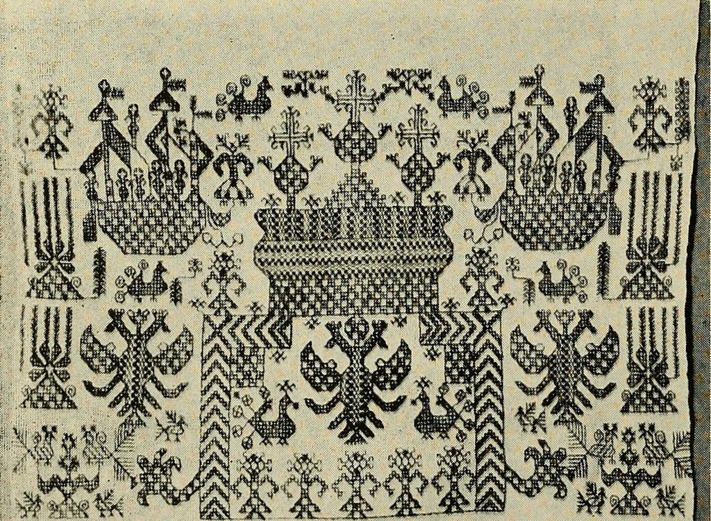 An illustration from Exhibition of national Russian art, 17th, 18th and early 19th centuries : peasant embroideries, costumes, headdresses, hand-woven materials, laces, ikons, articles of silver, copper, etc., 1900, leaf 21