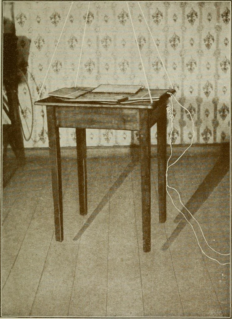 An illustration from Experiments in psychical science, levitation, contact, and the direct voice, 1919, leaf 180