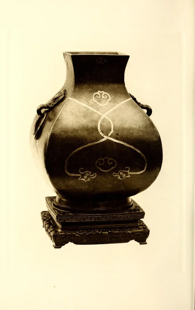 An illustration from A few examples of oriental art, illustrated in colour selcted from the Larkin Gallery, 104, New Bond Street, W., consisting of blue and white famille verte, famille rose, and monochrome porcelains, pottery, bronzes, cloisonne, Hardstones, Rugs, etc, leaf 8