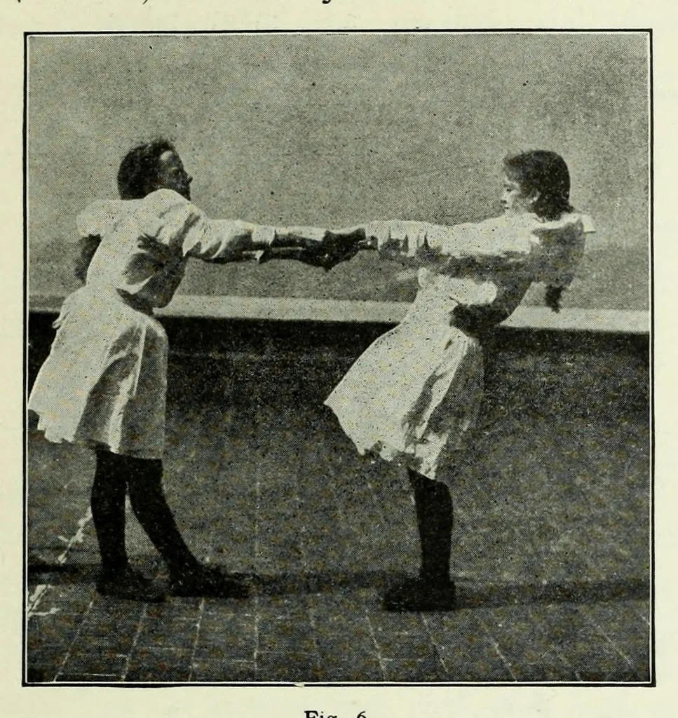 An illustration from Folk-dances and singing games; twenty-six folk-dances of Norway, Sweden, Denmark, Russia, Bohemia, Hungary, Italy, England, Scotland and Ireland, 1909, leaf 29