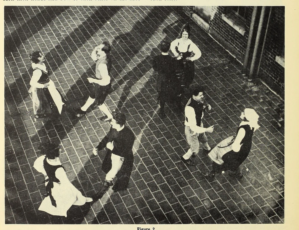 An illustration from Folk-dances and singing games: twentysix folk-dances of Norway, Sweden, Denmark, Russia, Bohemia, Hungary, Italy, England, Scotland and Ireland, with the music, full illustrations;, 1902, leaf 52