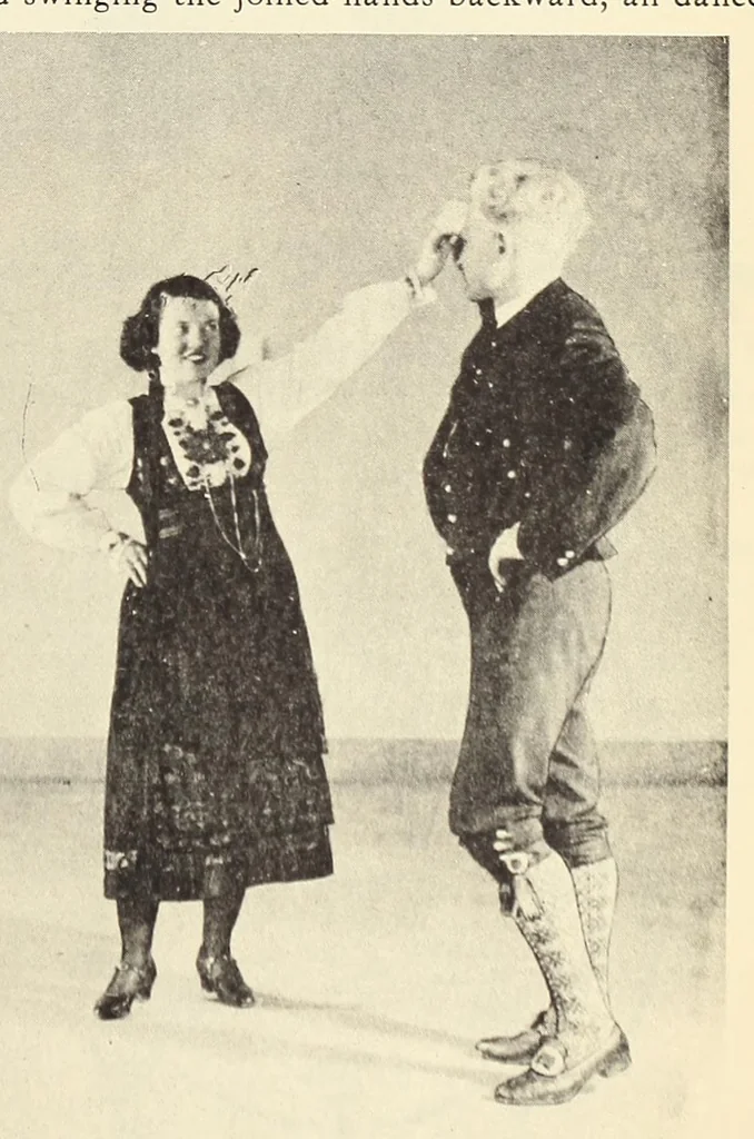 An illustration from Folk-dances and singing games: twentysix folk-dances of Norway, Sweden, Denmark, Russia, Bohemia, Hungary, Italy, England, Scotland and Ireland, with the music, full illustrations;, 1902, leaf 65