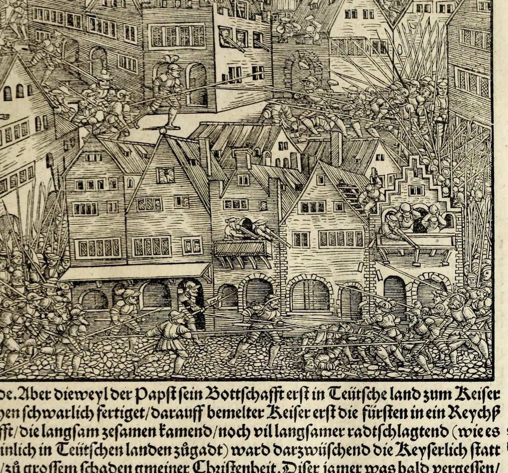 An illustration from Gemeiner loblicher Eydgnoschafft Stetten, Landen vnd Völckeren Chronick wirdiger Thaaten Beschreybung : hieriñ wirt auch die Gelegenheit der gantzen Europe : item ein kurtzuer griffne Chronica Germanie oder Teütschlands : in sonders aber ein fleyssige histori vnd ordenliche Beschreybung Gallie oder Franckrychs fürgestellt : darauff deñ obgedachte der Eydgnoschafft Beschreybung volget ..., 1548, leaf 43