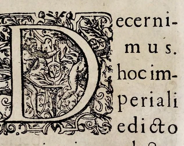 An illustration from Henrici Günteri Thülemarii ... Tractatio de Bulla Aurea, argentea, plumbea et cerea in genere, nec non in specie : de Aurea bulla Caroli IV imperatoris : Accedunt I. Textus Aureae bullae Caroli IV imper. anno 1356 Norimbergae & Metis sancitae ex autographo francofurtano fideliter descriptus. II. Copia MSti Aureae bullae Carolinae, quod in augustissima Bibliotheca vindobenensi invenitur ... III. & IV. Copiae duarum versionum germanicarum Aureae istius bullae, quae in dicta augustissima Bibliotheca caesarea & Curia francofurtana custodiuntur. V. Aurea bulla Andronici imperatoris constantinopolitani cum notis & addit. VI. Aurea bulla brabantina cum commentar. VII. Capitulatio Maximiliani II imperatoris ex originali, quod in serenissimi electoris palatini archivo adservatur, integra edita, 1697, leaf 224