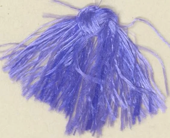 An illustration from The American practical dyer's companion : comprising a description of the principal dye-stuffs and chemicals used in dyeing, their nature and uses, mordants, and how made : with the best American, English, French, and German processes ... embracing in all over eight hundred receipts for colors and shades, accompanied by one hundred and seventy dyed samples of raw materials and fabrics, 1882, leaf 73