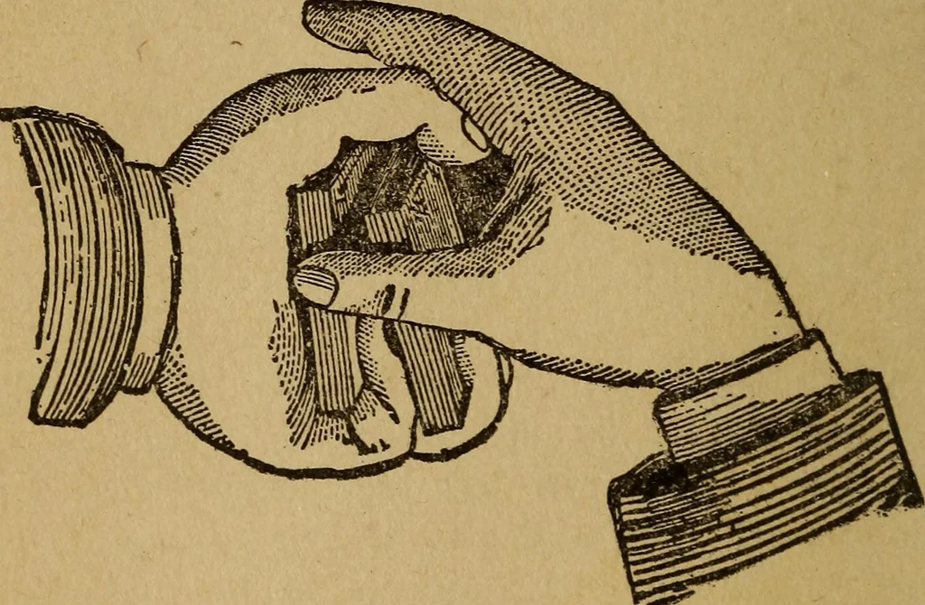 An illustration from Herrmann's wizards' manual; a practical treatise on coin tricks, 1916, leaf 45