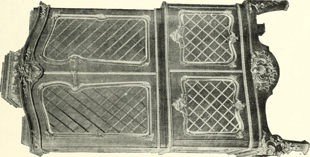 An illustration from An historical guide to French interiors, furniture, decoration, woodwork, & allied arts during the last half of the seventeenth century, the whole of the eighteenth century, and the earlier part of the nineteenth, 1900, leaf 205